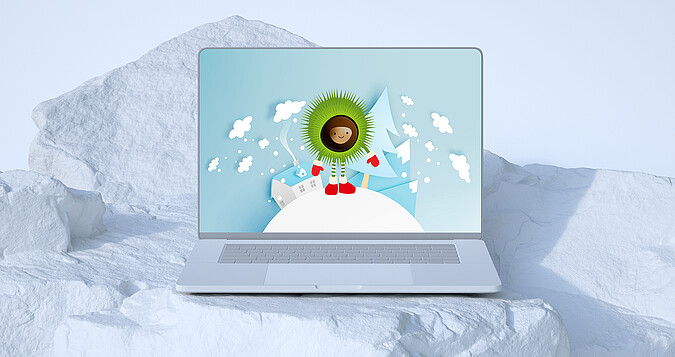 Laptop im Schnee mit Wallpaper Marone